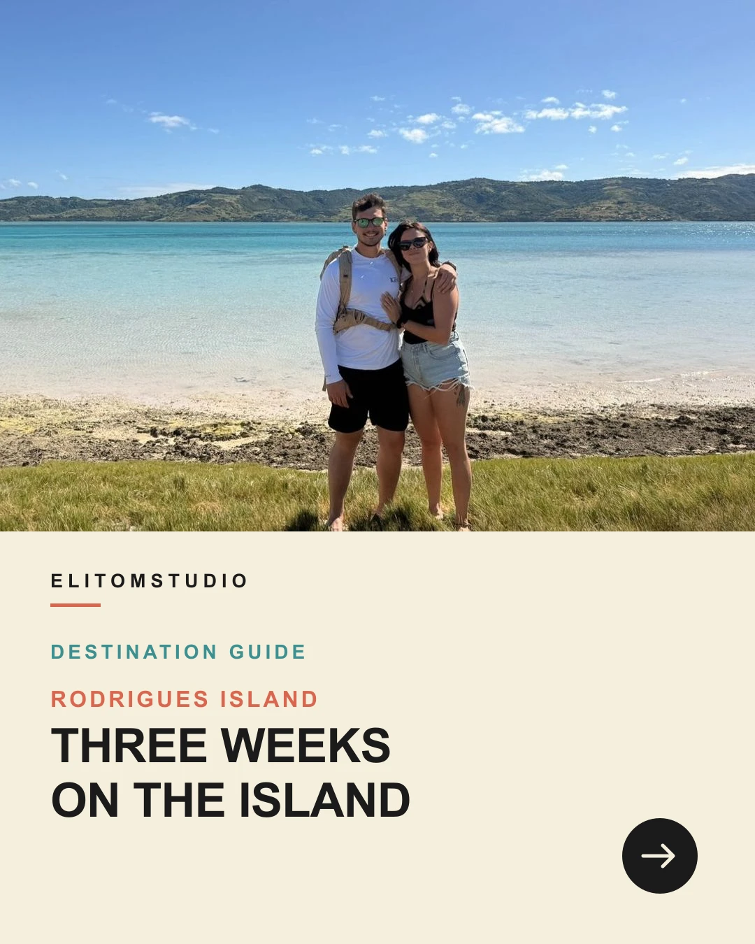 Eli and Tom standing beside the turquoise lagoon on Rodrigues Island.
